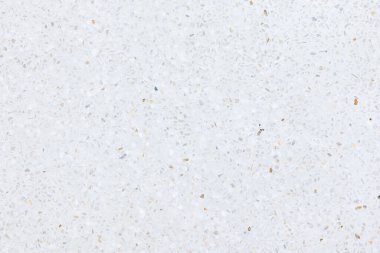 Terrazzo 'nun zemini pürüzsüz. Parlak parlak beyaz bir görünüm. Betonla karıştırılmış mermer çakıl. İç dekorasyon için pürüzsüz bir yüzey, mimari tasarım. Arkaplan için uygun.