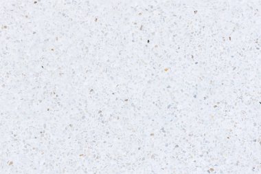 Terrazzo 'nun zemini pürüzsüz. Parlak parlak beyaz bir görünüm. Betonla karıştırılmış mermer çakıl. İç dekorasyon için pürüzsüz bir yüzey, mimari tasarım. Arkaplan için uygun.