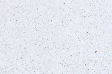 Terrazzo 'nun zemini pürüzsüz. Parlak parlak beyaz bir görünüm. Betonla karıştırılmış mermer çakıl. İç dekorasyon için pürüzsüz bir yüzey, mimari tasarım. Arkaplan için uygun.