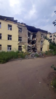 destroyed and burned houses in the city during the war in Ukraine. broken house, Russian-Ukrainian war. a rocket hit a school, the educational institution was destroyed. Donetsk region. Donbass clipart