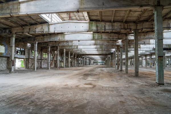 stock image Ruined industrial area, abandoned ruins of a plant or factory. Huge vacant lot. Background with copy space