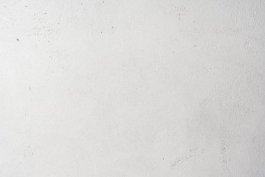 Sert desenli beton yüzey beyaza boyanmış. Grunge arkaplanı