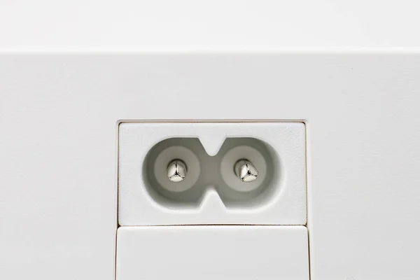 AC power socket. Selective focus, light background. Copy space for text or inscription
