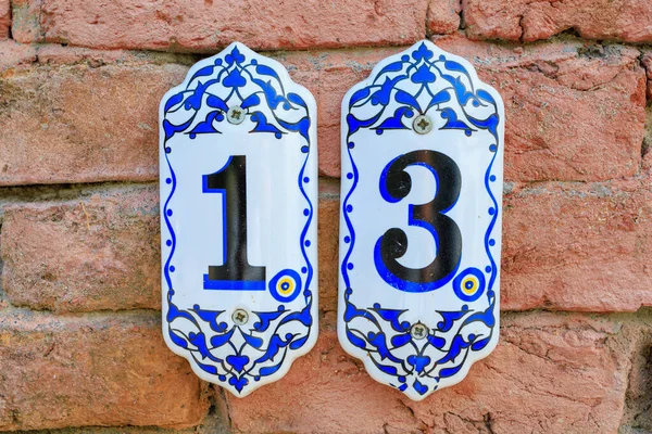 Number 13 house pointer plate. Background with copy space for text