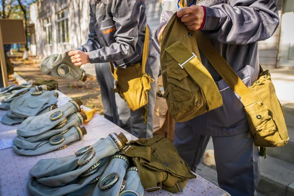 Military bag with personal protective equipment in case of emergency. Background with copy space