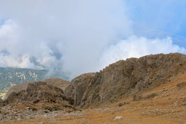 Very beautiful view from the top of Mount Tahtali or Olympos of the Kemer district of Antalya province in Turkey. A popular tourist spot for sightseeing and skydiving. Background or landscape