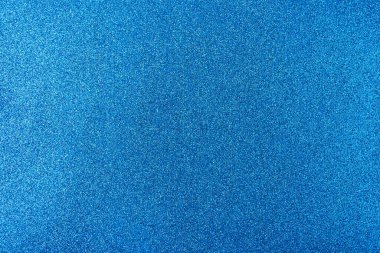 Işıltılı bir arka plan. Arkaplanda simler var. Parlak desenli yüzey. Güçlü mavi. Yumuşak ışık