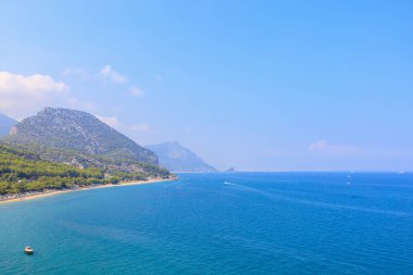 Very beautiful rocky Turkish Mediterranean coast in Beldibi district of Kemer, Antalya province in Turkey. Background or landscape