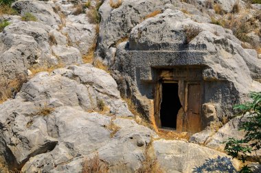 Lycian rock tombs of the necropolis in Demre, the former Kale in Turkey in the province of Antalya of the ancient city of Myra, one of the main centers of Lycia. Grandiose ancient ruins