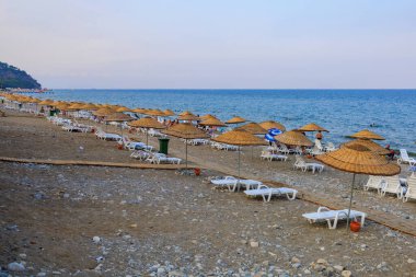 Central public city Turkish beach. Background. Antalya province, Kemer region. August 5, 2022 Beldibi Turkey