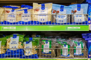 Seeds and nuts ingredients for proper nutrition on the store shelf. Illustrative editorial. May 12, 2022 Balti Moldova