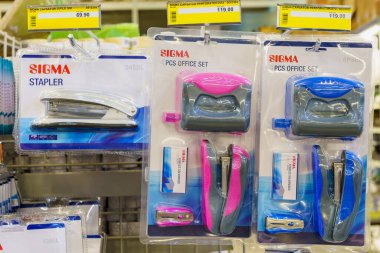 Staplers and punchers on the store shelf. Illustrative editorial. February 2, 2022 Balti Moldova
