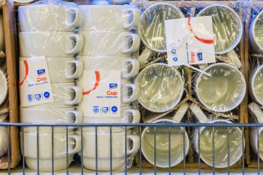 Mugs and cups for hot drinks on a store shelf. Illustrative editorial. May 12, 2022 Balti Moldova