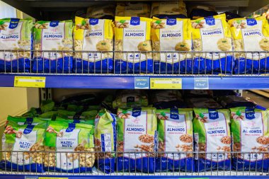 Nuts and ingredients for proper balanced nutrition on the store shelf. Illustrative editorial. May 12, 2022 Balti Moldova