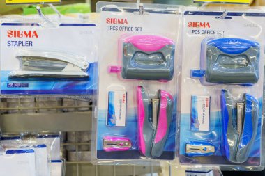 Staplers and punchers on the store shelf. Illustrative editorial. February 2, 2022 Balti Moldova