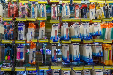 Writing pens with selective focus on a store shelf. Illustrative editorial. February 2, 2022 Balti Moldova