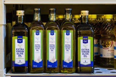 Olive oil on the store shelf. Illustrative editorial. May 12, 2022 Balti Moldova