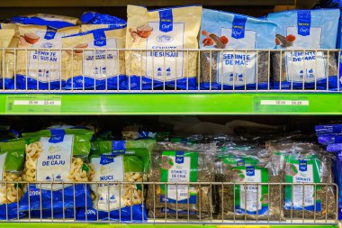 Seeds and nuts ingredients for proper nutrition on the store shelf. Illustrative editorial. May 12, 2022 Balti Moldova