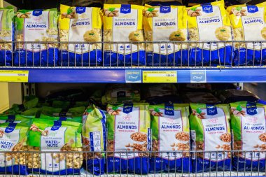 Nuts and ingredients for proper balanced nutrition on the store shelf. Illustrative editorial. May 12, 2022 Balti Moldova