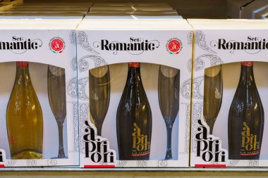 Romantic set of sparkling wine with glasses on the store shelf. Illustrative editorial. February 10, 2022 Balti Moldova