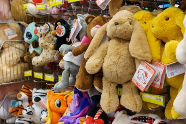 Cute soft toys with selective focus on the store shelf. Illustrative editorial. February 24, 2022 Balti Moldova