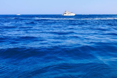 Yacht or boat on the high seas. Background with copy space. August 9, 2022 Kemer, Antalya province, Turkey.