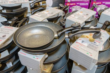 Frying pans on a supermarket shelf or showcase. Illustrative editorial. March 18, 2022 Beltsy Moldova
