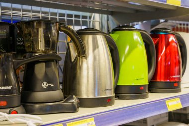 Electric kettles on a supermarket shelf or showcase. Illustrative editorial. March 18, 2022 Beltsy Moldova