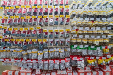 Section with fasteners and screws. Goods in a building materials store. June 24, 2022 Beltsy Moldova.