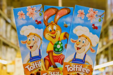 Chocolates Toffifee sweets for the Easter table. Goods on the store shelf, supermarket showcase. April 14, 2022 Beltsy Moldova.