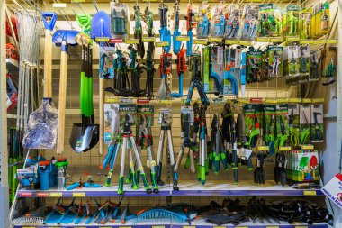 Tools for the garden and vegetable garden in the household department of the supermarket. February 17, 2022 Beltsy Moldova.