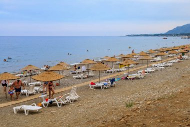 August 11, 2022 Beldibi, Kemer district, Antalya Province, Turkey. City public beach. Background with copy space for text