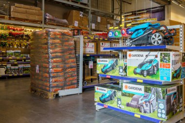 Lawn mowers for a personal plot in the household department of a supermarket. February 17, 2022 Beltsy Moldova.