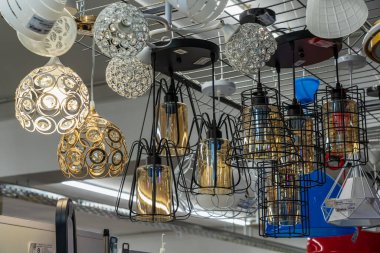 Lamps, selective focus. Goods in a building materials store. June 24, 2022 Beltsy Moldova.