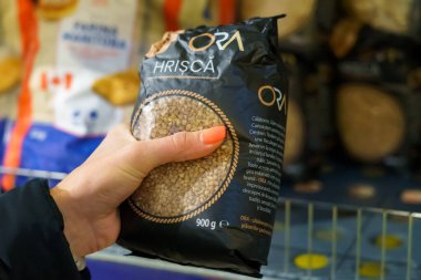 Buckwheat in the hand of the buyer, socially significant goods. January 26, 2022 Beltsy Moldova.