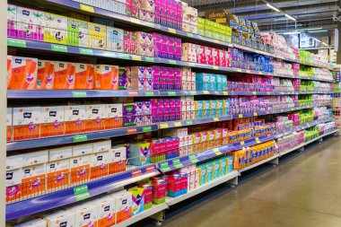 Shelf with pads in the department of the personal care store. April 7, 2022 Beltsy Moldova.