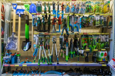 Tools for the garden and vegetable garden in the household department of the supermarket. February 17, 2022 Beltsy Moldova.