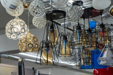 Lamps, selective focus. Goods in a building materials store. June 24, 2022 Beltsy Moldova.