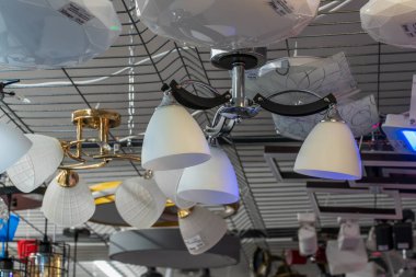Lamps, selective focus. Goods in a building materials store. June 24, 2022 Beltsy Moldova.