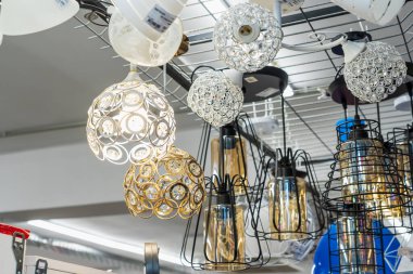 Lamps, selective focus. Goods in a building materials store. June 24, 2022 Beltsy Moldova.