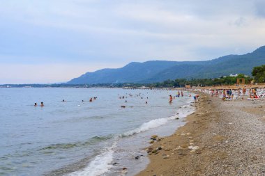 August 11, 2022 Beldibi, Kemer district, Antalya Province, Turkey. City public beach. Background with copy space for text