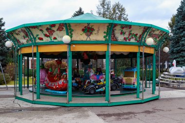 Urban carousels in the Christmas town. December 17, 2021 Balti Moldova.