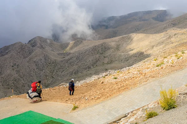 Thrill-seekers on the top of Mount Tahtali. Illustrative editorial. August 9, 2022 mountain near Kemer, Antalya province, Turkey