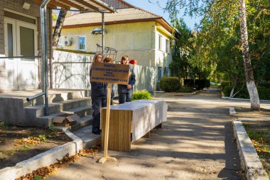 Place of issue of gas masks with selective focus. Editorial news background. October 11, 2022 Beltsy Moldova.