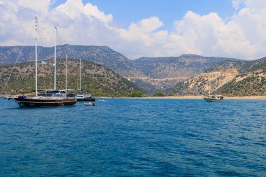 August 10, 2022 Demre, Antalya province, Turkey. Yachts off the Mediterranean coast. Background with copy space for text