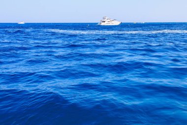 Yacht or boat on the high seas. Background with copy space. August 9, 2022 Kemer, Antalya province, Turkey.