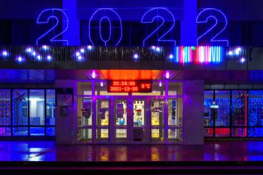 The lights of the night city, decorated with garlands for the Christmas and New Year holidays. December 20, 2021 Balti Moldova.