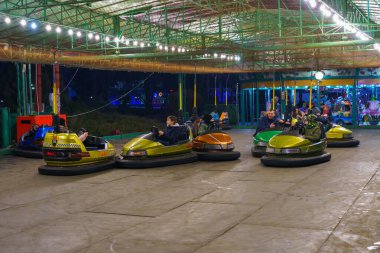 Night view of the carousels in the New Year or Christmas town. December 24, 2021 Balti Moldova.