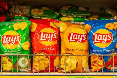 Chips Lays. Goods in the supermarket. June 15, 2022 Beltsy Moldova.