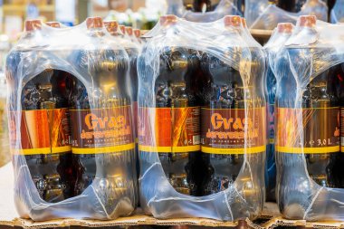 Packaging with plastic bottles of kvass. Goods in the supermarket. June 15, 2022 Beltsy Moldova.